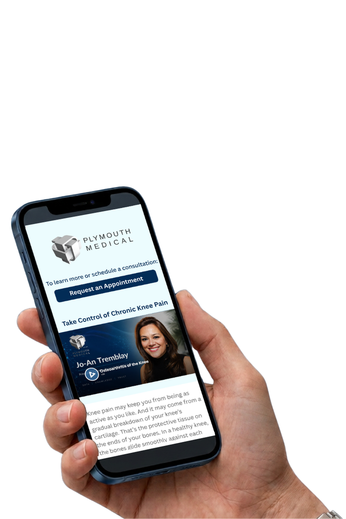 Hand holding a cell phone with the screen showing a personalized education video.